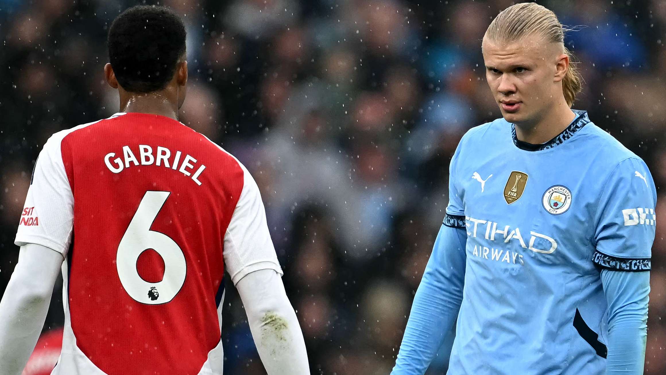 Haaland flashes gold Premier League badge at Gabriel  