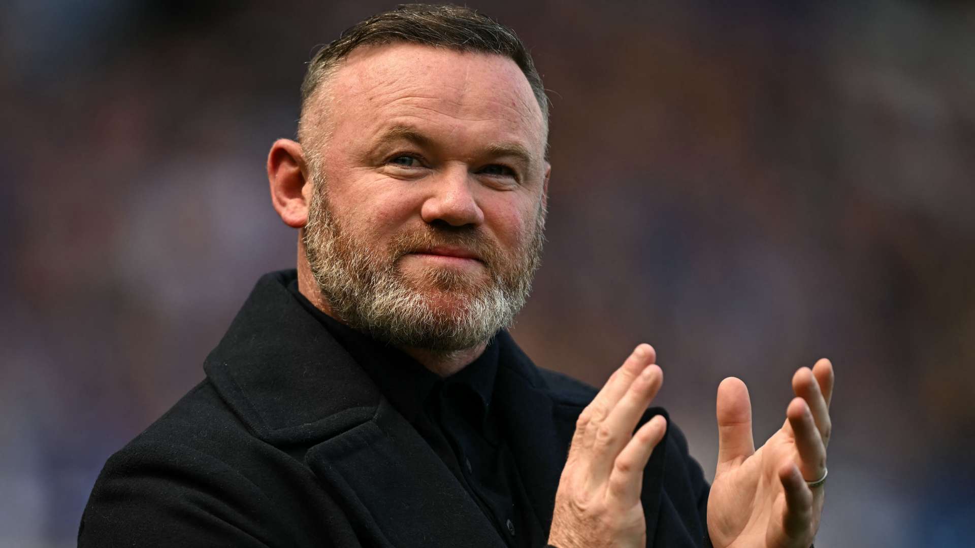 Rooney explains why he's taking a 'stand off approach' with son Kai  