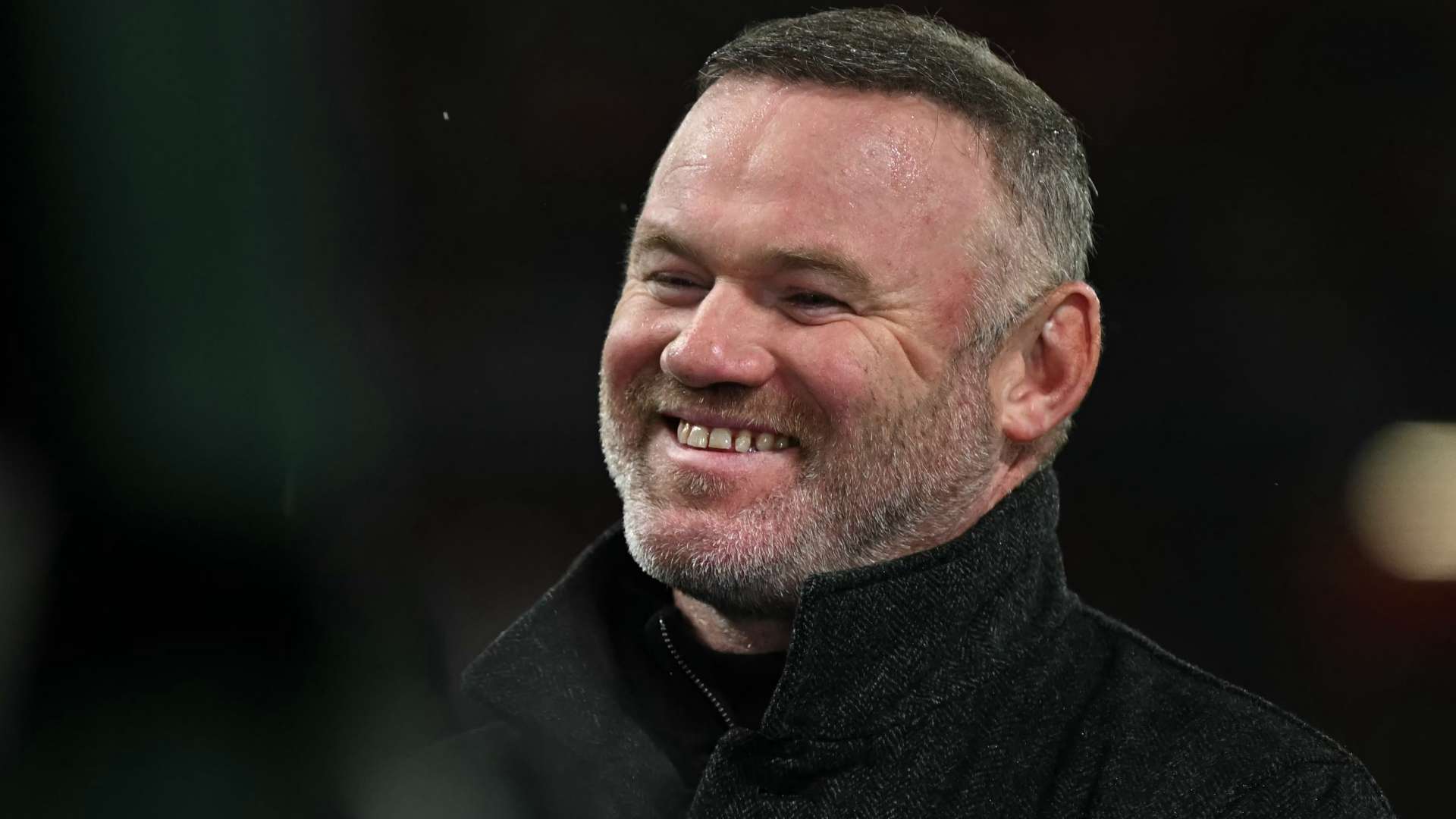 Wardrobe mishap! Rooney watched Kai at Old Trafford in pyjamas  