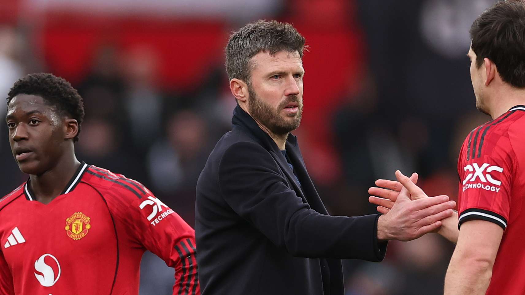 Carrick reacts as Rooney backs him for permanent Man Utd job  